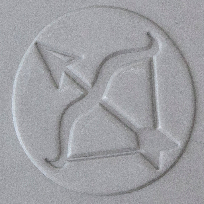 Jewelry Artist Elements - Texture - Astrology - Sagittarius sample in gray clay