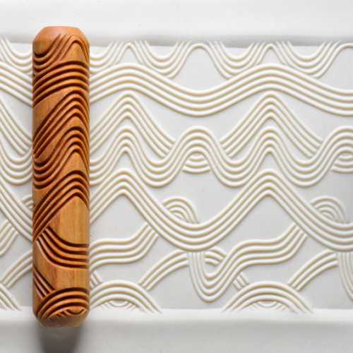 Large Wooden Hand Roller - Wavy Lines rolled into clay