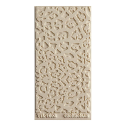 Texture Tile - Jaguar Print Embossed. Beige Texture Tiles are flexible, washable and can be used with any soft clay. Spritz with CoolSlip or dust on Dry Powder Release for stick-free impressions when using metal clay and polymer clay.