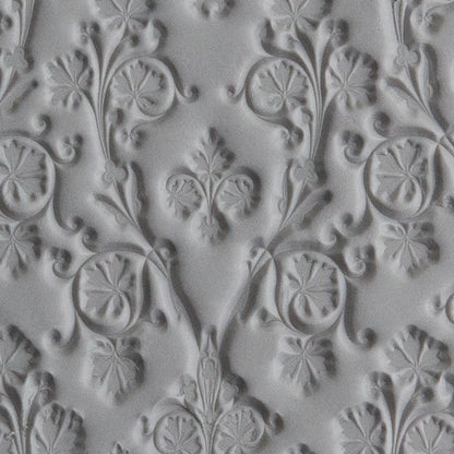 Texture Tile - Celtic Elegance sample rolled into gray polymer clay