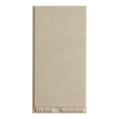 Texture Tile - High Surf Embossed. Beige Texture Tiles are flexible, washable and can be used with any soft clay. Spritz with CoolSlip or dust on Dry Powder Release for stick-free impressions when using metal clay and polymer clay.