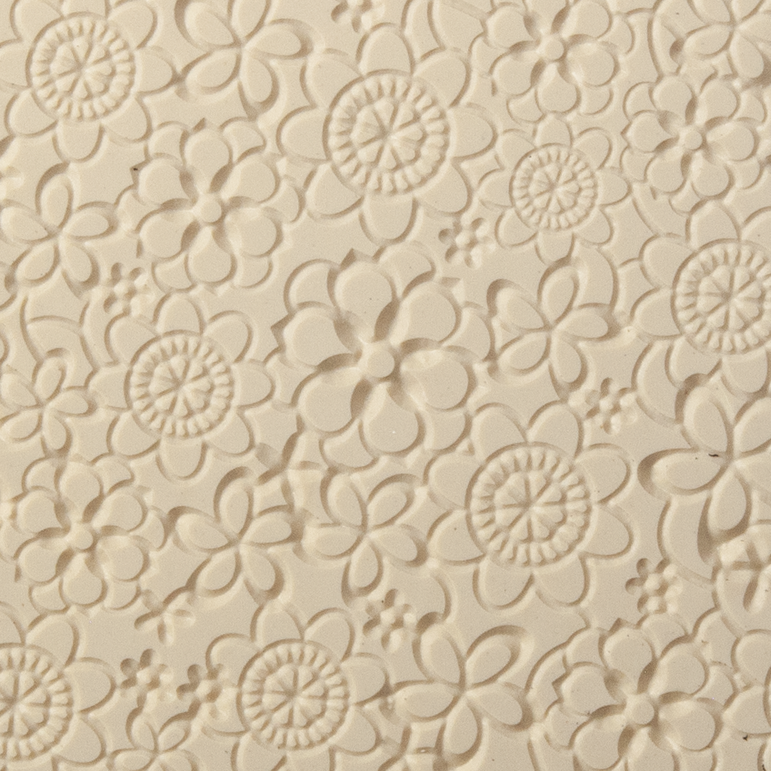Texture Tile - Floral Web Embossed. Beige Texture Tiles are flexible, washable and can be used with any soft clay. Spritz with CoolSlip or dust on Dry Powder Release for stick-free impressions when using metal clay and polymer clay.