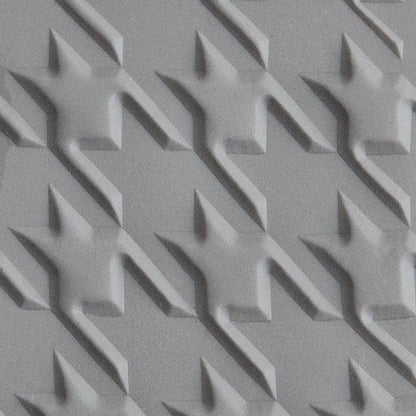 Texture Tile - Houndstooth sample rolled into gray polymer clay