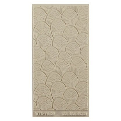 Texture Tile - Lolli Sunrise Embossed Beige Texture Tiles are flexible, washable and can be used with any soft clay. Spritz with CoolSlip or dust on Dry Powder Release for stick-free impressions when using 