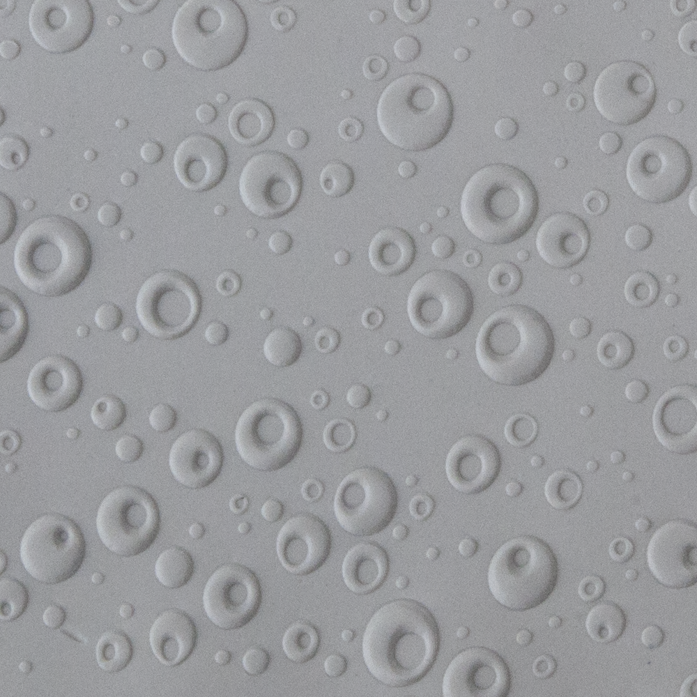 Texture Tile - Double Bubble Embossed sample rolled into clay