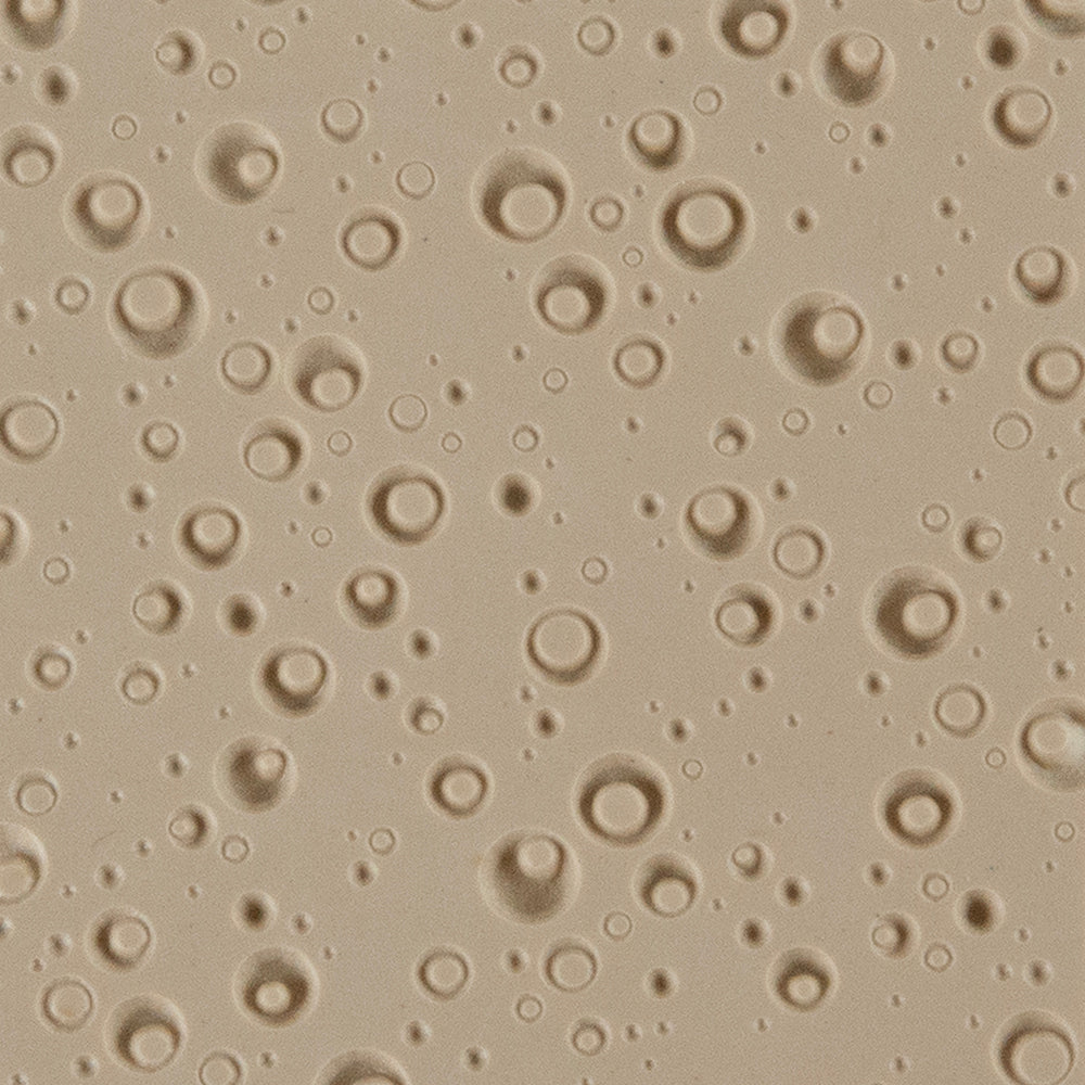 Texture Tile - Double Bubble Embossed. Beige Texture Tiles are flexible, washable and can be used with any soft clay. Spritz with CoolSlip or dust on Dry Powder Release for stick-free impressions when using metal clay and polymer clay.