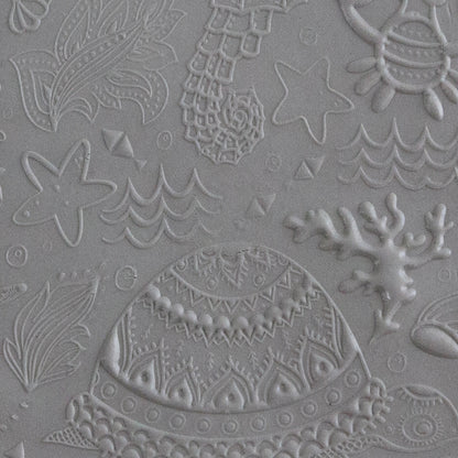 Texture Tile - Under the Sea Embossed sample in polymer clay