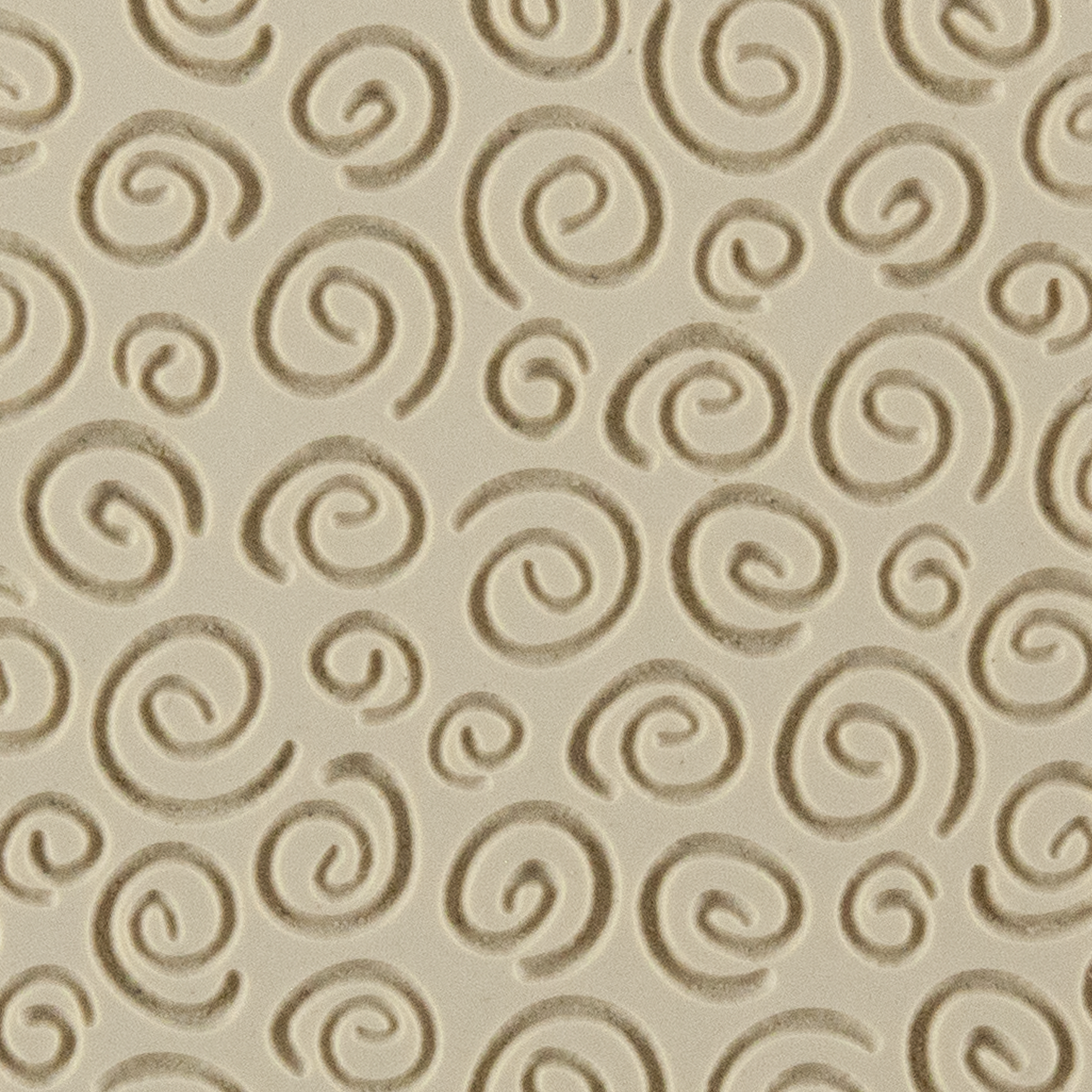 Texture Tile - Spirals Embossed. Beige Texture Tiles are flexible, washable and can be used with any soft clay. Spritz with CoolSlip or dust on Dry Powder Release for stick-free impressions when using metal clay and polymer clay.