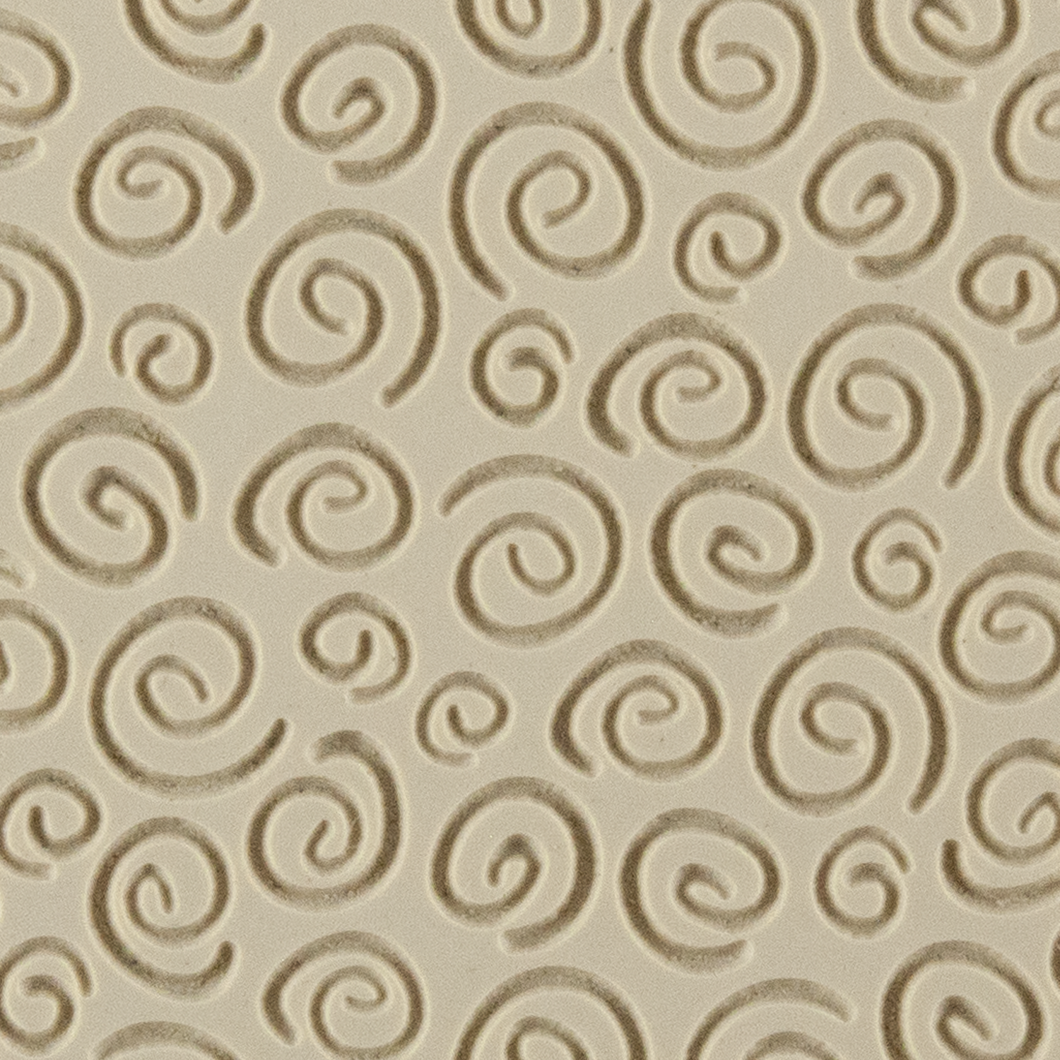 Texture Tile - Spirals Embossed. Beige Texture Tiles are flexible, washable and can be used with any soft clay. Spritz with CoolSlip or dust on Dry Powder Release for stick-free impressions when using metal clay and polymer clay.