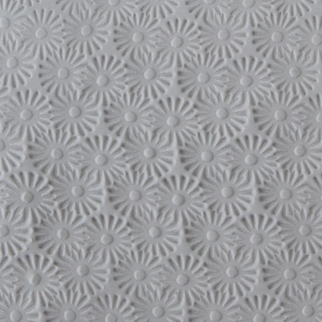 Texture Tile - Starburst sample rolled into clay