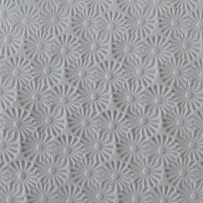 Texture Tile - Starburst sample rolled into clay