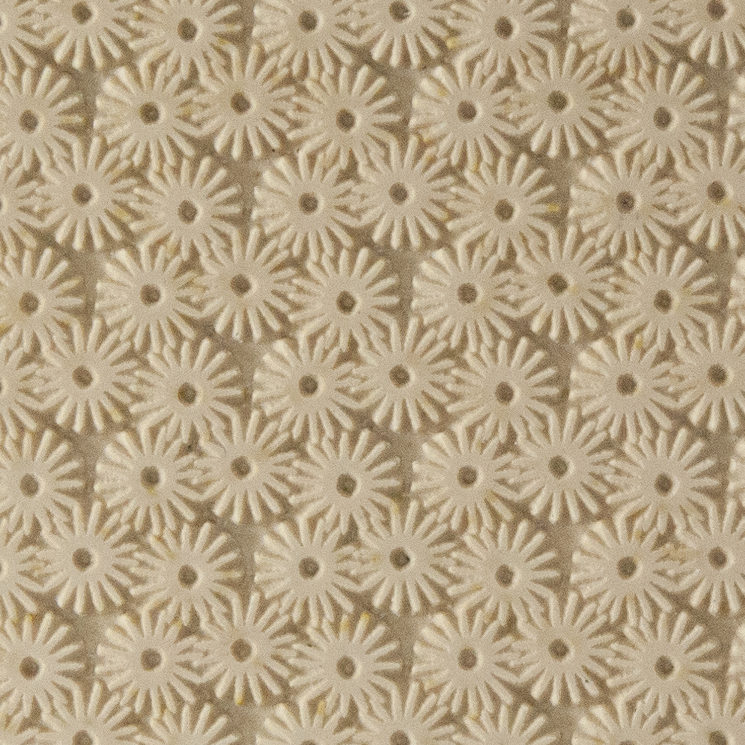 Texture Tile - Starburst. Beige Texture Tiles are flexible, washable and can be used with any soft clay. Spritz with CoolSlip or dust on Dry Powder Release for stick-free impressions when using metal clay and polymer clay.
