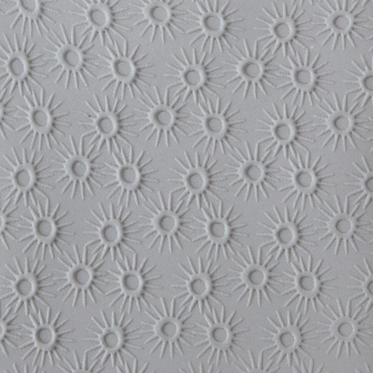Texture Tile - Starburst Embossed sample rolled into clay