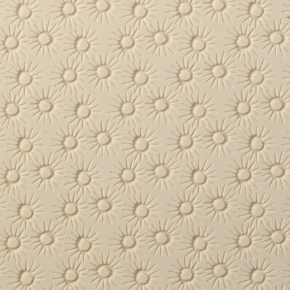 Texture Tile - Starburst Embossed. Beige Texture Tiles are flexible, washable and can be used with any soft clay. Spritz with CoolSlip or dust on Dry Powder Release for stick-free impressions when using metal clay and polymer clay.