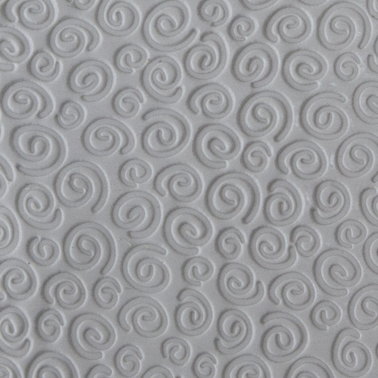 Texture Tile - Spirals Mini sample rolled into clay