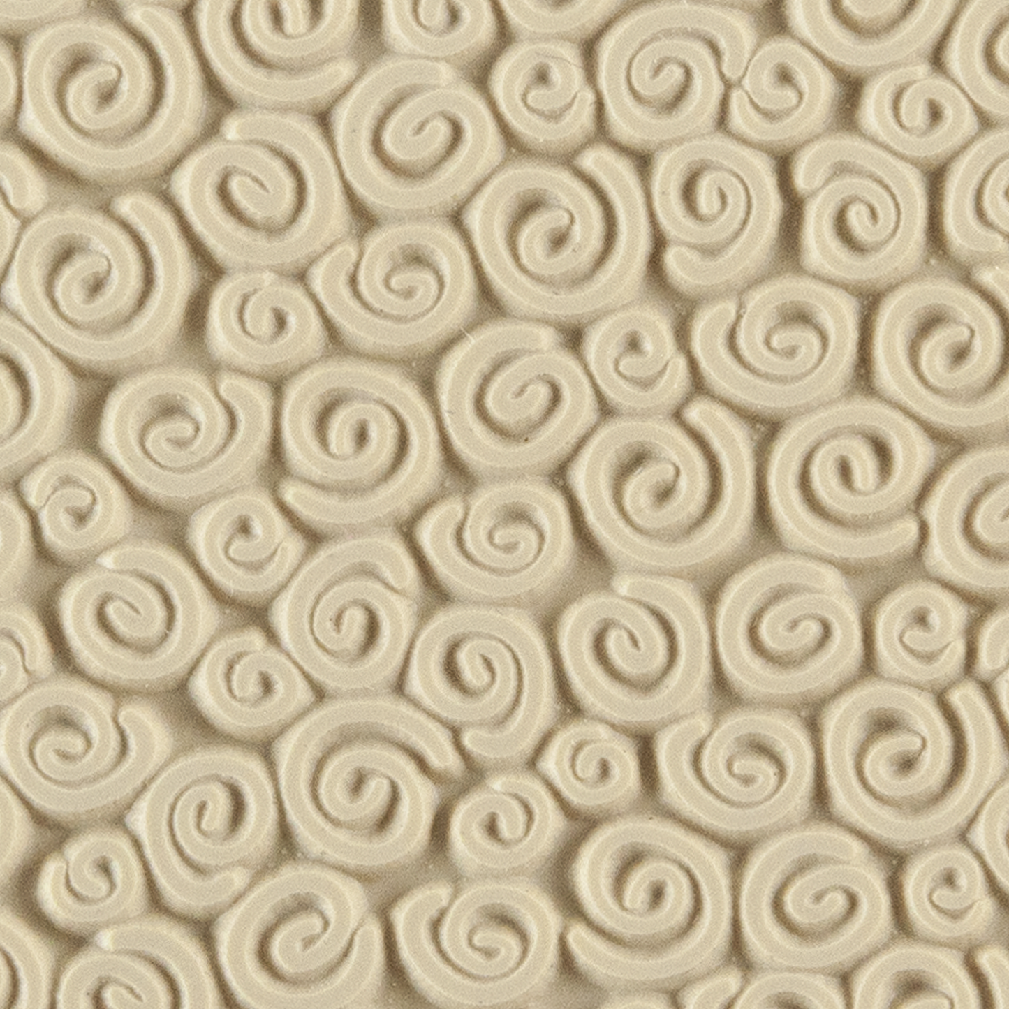 Texture Tile - Spirals Mini. Beige Texture Tiles are flexible, washable and can be used with any soft clay. Spritz with CoolSlip or dust on Dry Powder Release for stick-free impressions when using metal clay and polymer clay.