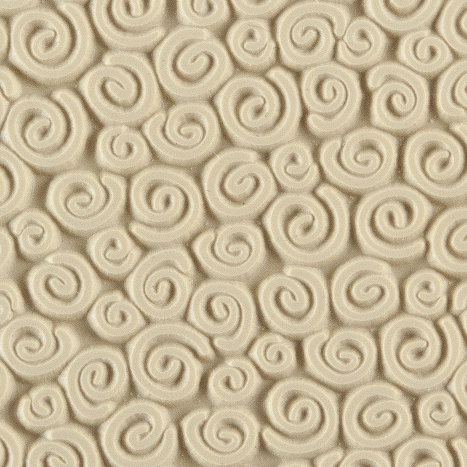 Texture Tile - Spirals Mini. Beige Texture Tiles are flexible, washable and can be used with any soft clay. Spritz with CoolSlip or dust on Dry Powder Release for stick-free impressions when using metal clay and polymer clay.