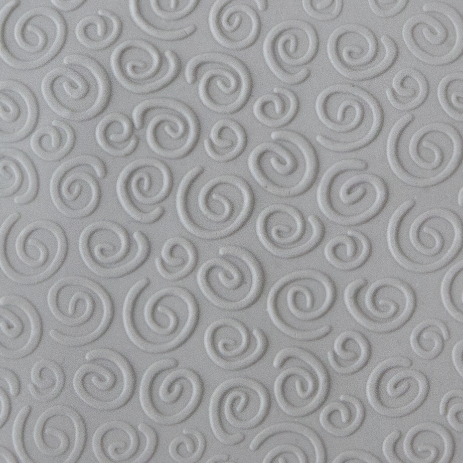 Texture Tile - Spirals Mini Embossed sample rolled into clay