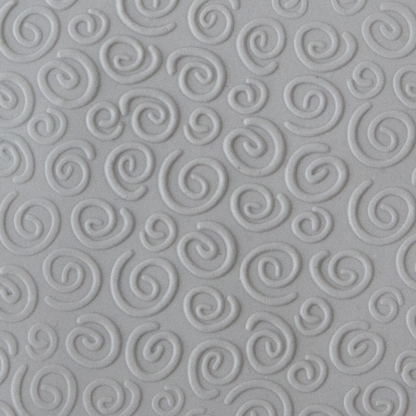 Texture Tile - Spirals Mini Embossed sample rolled into clay