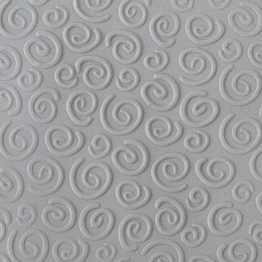 Texture Tile - Spirals Mini Embossed sample rolled into clay