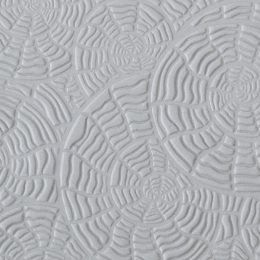 Texture Tile - Nautilus sample rolled into clay