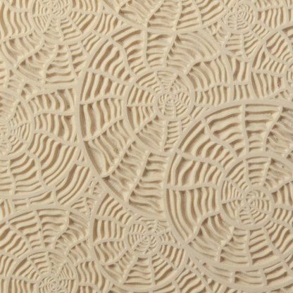 Texture Tile - Nautilus. Beige Texture Tiles are flexible, washable and can be used with any soft clay. Spritz with CoolSlip or dust on Dry Powder Release for stick-free impressions when using metal clay and polymer clay.