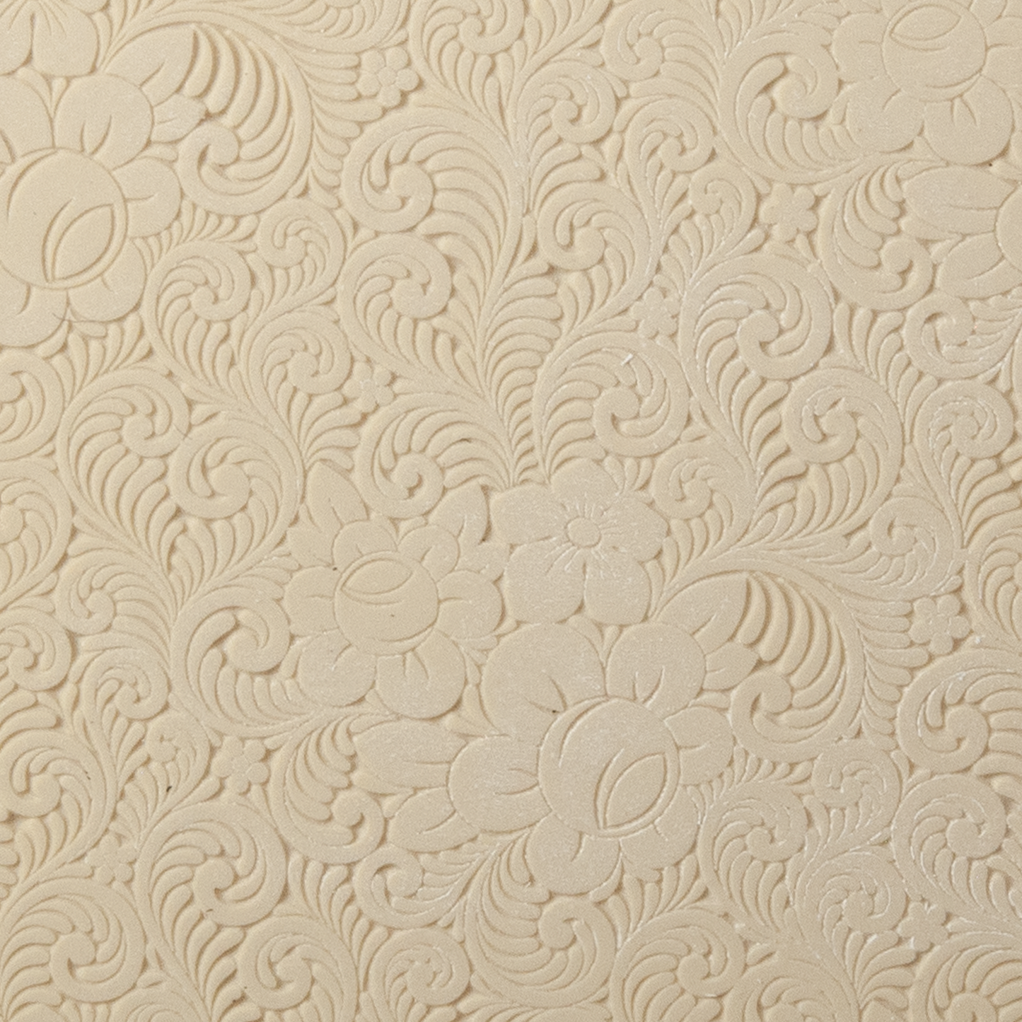 Texture Tile - Roses and Swirls Embossed. Beige Texture Tiles are flexible, washable and can be used with any soft clay. Spritz with CoolSlip or dust on Dry Powder Release for stick-free impressions when using metal clay and polymer clay.