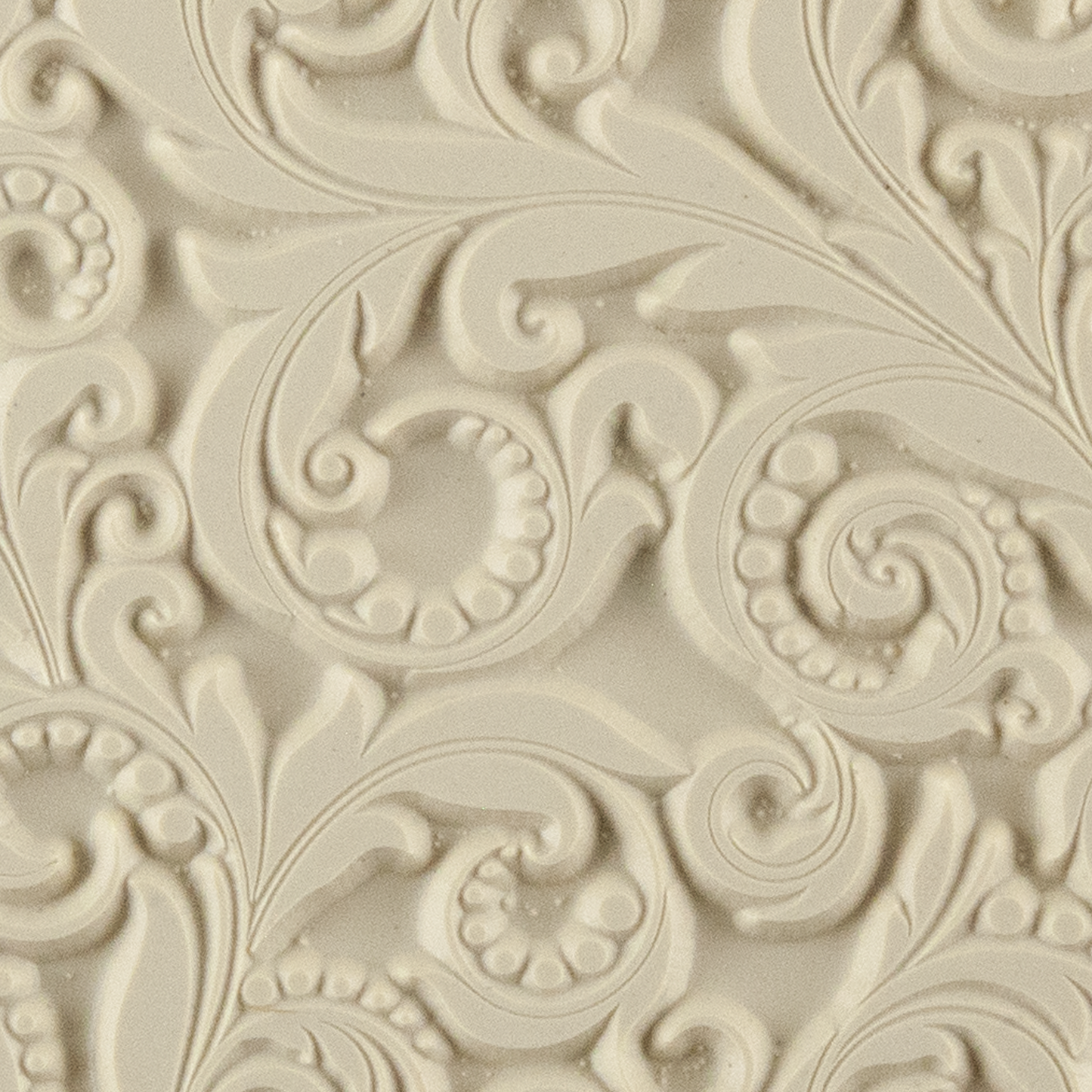 Texture Tile - Leaves and Dots. Beige Texture Tiles are flexible, washable and can be used with any soft clay. Spritz with CoolSlip or dust on Dry Powder Release for stick-free impressions when using metal clay and polymer clay.