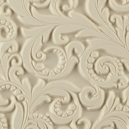 Texture Tile - Leaves and Dots. Beige Texture Tiles are flexible, washable and can be used with any soft clay. Spritz with CoolSlip or dust on Dry Powder Release for stick-free impressions when using metal clay and polymer clay.