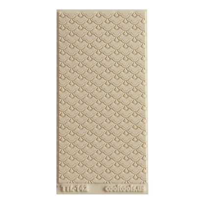 Texture Tile - Nested Scallops. Beige Texture Tiles are flexible, washable and can be used with any soft clay. Spritz with CoolSlip or dust on Dry Powder Release for stick-free impressions when using metal clay and polymer clay.