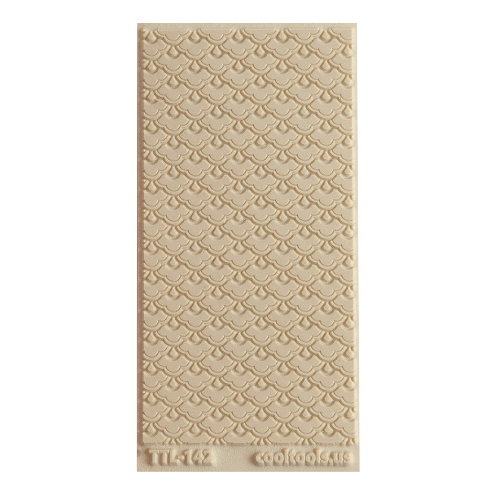 Texture Tile - Nested Scallops. Beige Texture Tiles are flexible, washable and can be used with any soft clay. Spritz with CoolSlip or dust on Dry Powder Release for stick-free impressions when using metal clay and polymer clay.