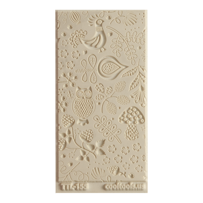 Texture Tile - Storybook Embossed. Beige Texture Tiles are flexible, washable and can be used with any soft clay. Spritz with CoolSlip or dust on Dry Powder Release for stick-free impressions when using metal clay and polymer clay.