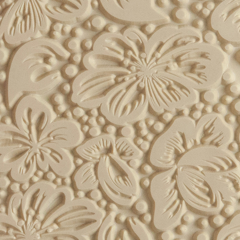 Texture Tile - Spring Sky. Beige Texture Tiles are flexible, washable and can be used with any soft clay. Spritz with CoolSlip or dust on Dry Powder Release for stick-free impressions when using metal clay and polymer clay.