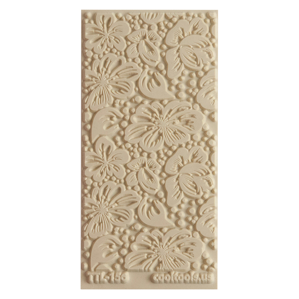 Texture Tile - Spring Sky. Beige Texture Tiles are flexible, washable and can be used with any soft clay. Spritz with CoolSlip or dust on Dry Powder Release for stick-free impressions when using metal clay and polymer clay.