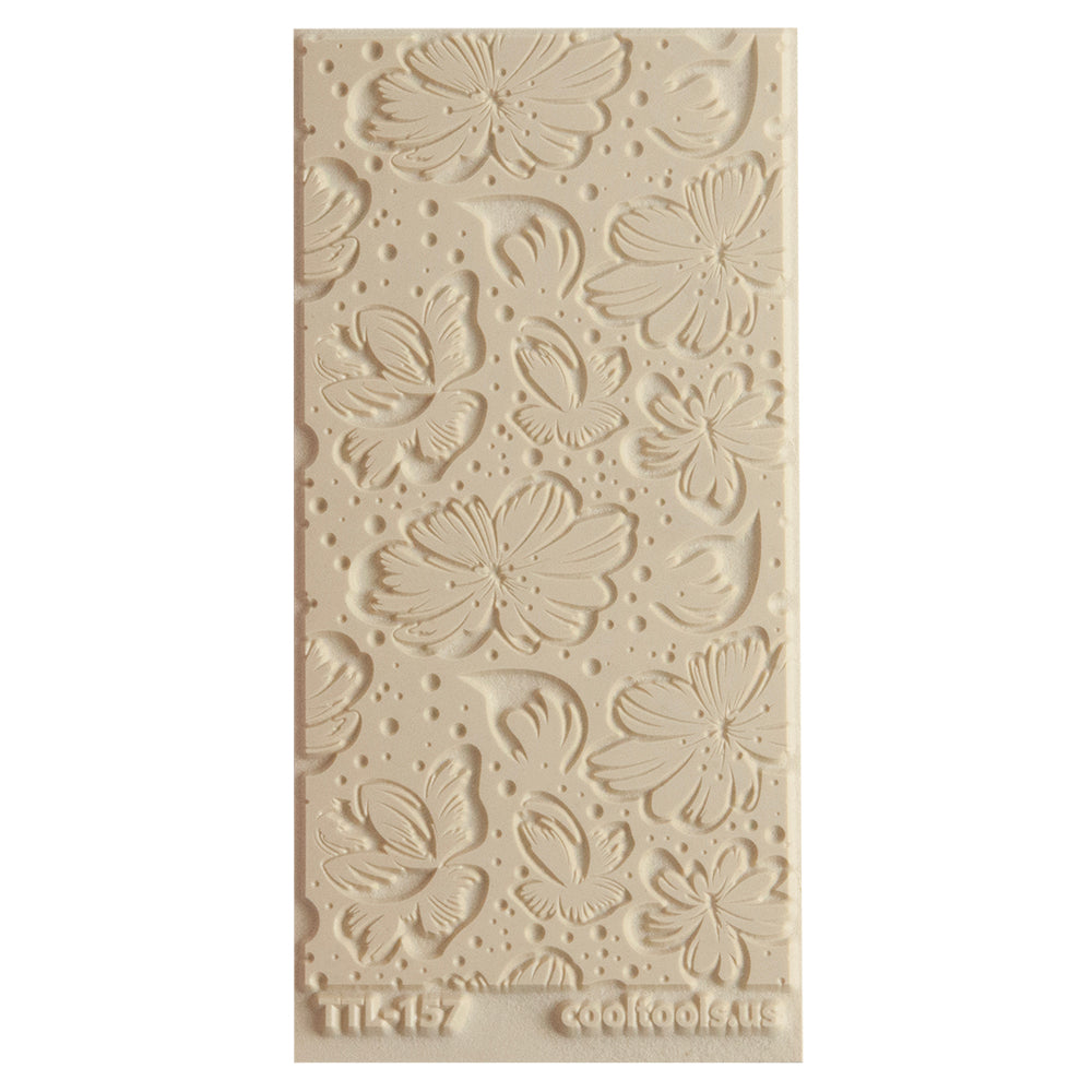 Beige Texture Tile - Spring Sky EmbossedTexture Tiles are flexible, washable and can be used with any soft clay. Spritz with CoolSlip or dust on Dry Powder Release for stick-free impressions when using metal clay and polymer clay.