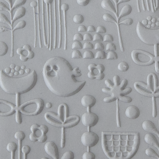 Texture Tile - Spring Cleaning Embossed sample rolled into clay