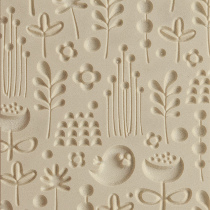 Texture Tile - Spring Cleaning Embossed. Beige Texture Tiles are flexible, washable and can be used with any soft clay. Spritz with CoolSlip or dust on Dry Powder Release for stick-free impressions when using metal clay and polymer clay.