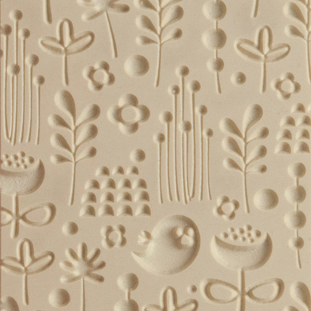 Texture Tile - Spring Cleaning Embossed. Beige Texture Tiles are flexible, washable and can be used with any soft clay. Spritz with CoolSlip or dust on Dry Powder Release for stick-free impressions when using metal clay and polymer clay.