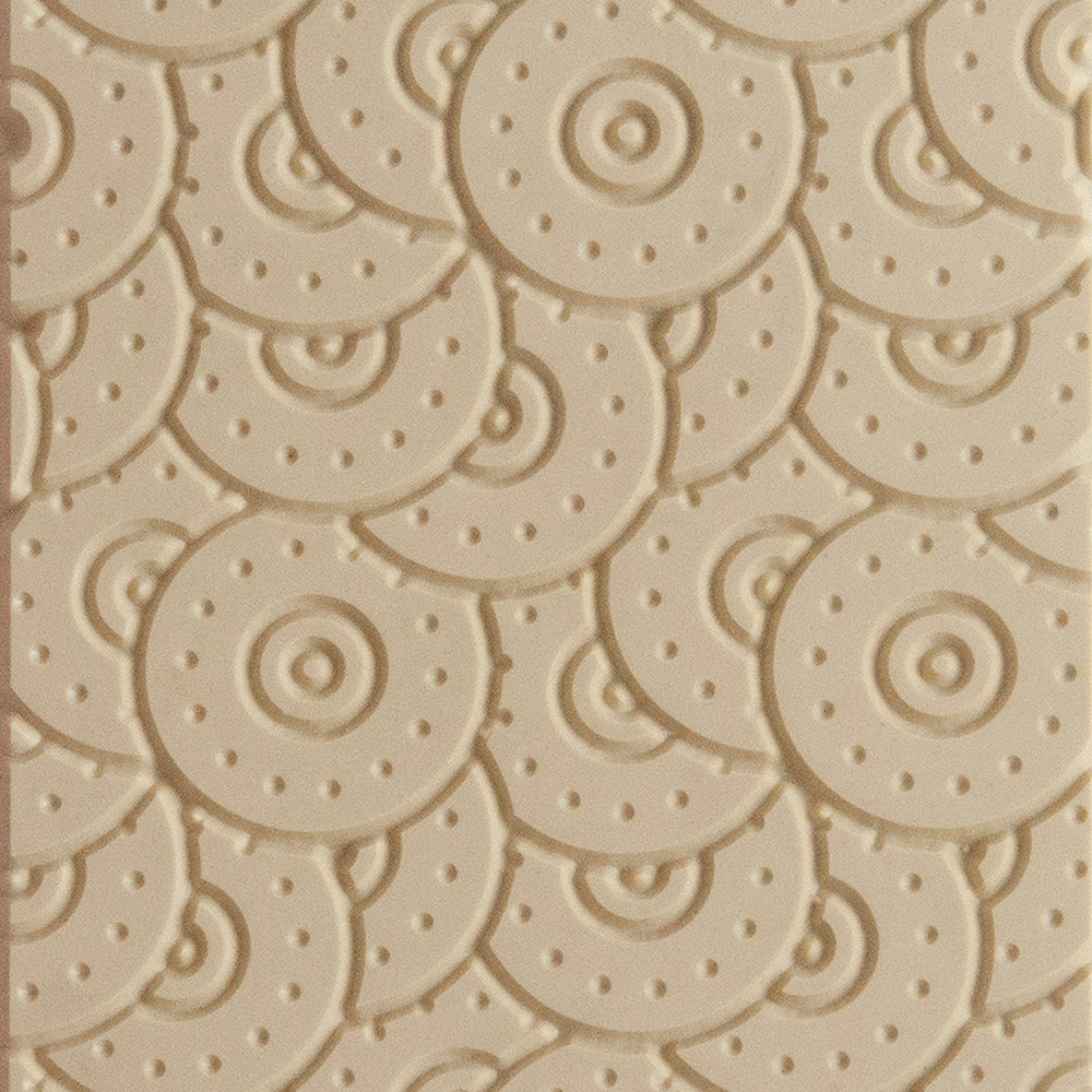 Texture Tile - Random Rivet Embossed. Beige Texture Tiles are flexible, washable and can be used with any soft clay. Spritz with CoolSlip or dust on Dry Powder Release for stick-free impressions when using metal clay and polymer clay.