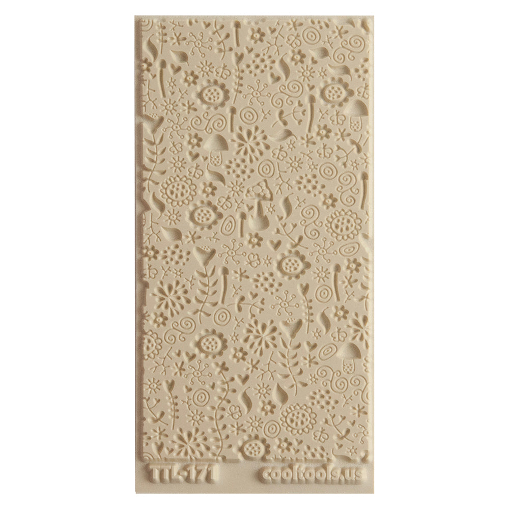 Texture Tile - Fairy Tale Embossed. Beige Texture Tiles are flexible, washable and can be used with any soft clay. Spritz with CoolSlip or dust on Dry Powder Release for stick-free impressions when using metal clay and polymer clay.