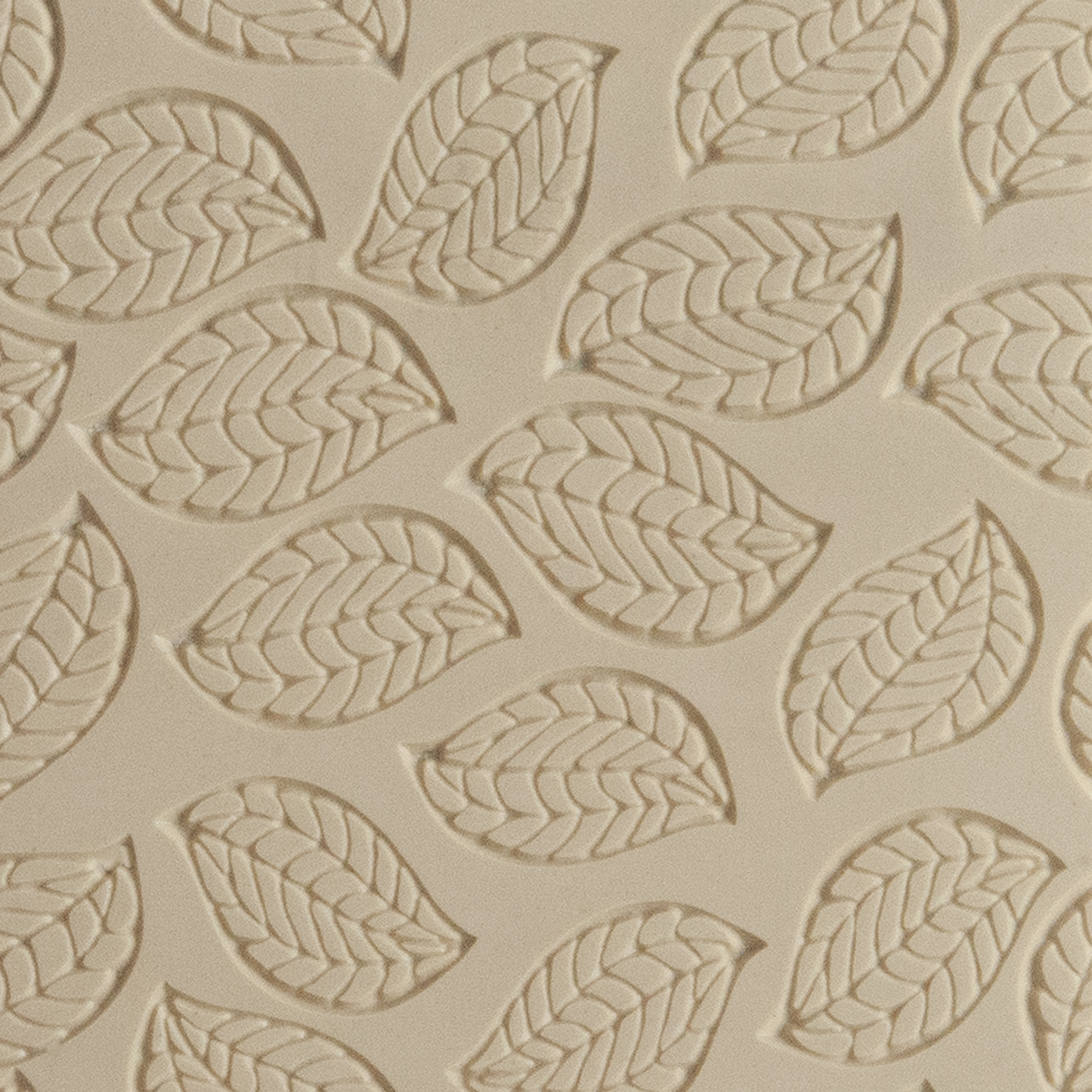 Texture Tile - Falling Leaves Embossed. Beige Texture Tiles are flexible, washable and can be used with any soft clay. Spritz with CoolSlip or dust on Dry Powder Release for stick-free impressions when using metal clay and polymer clay.