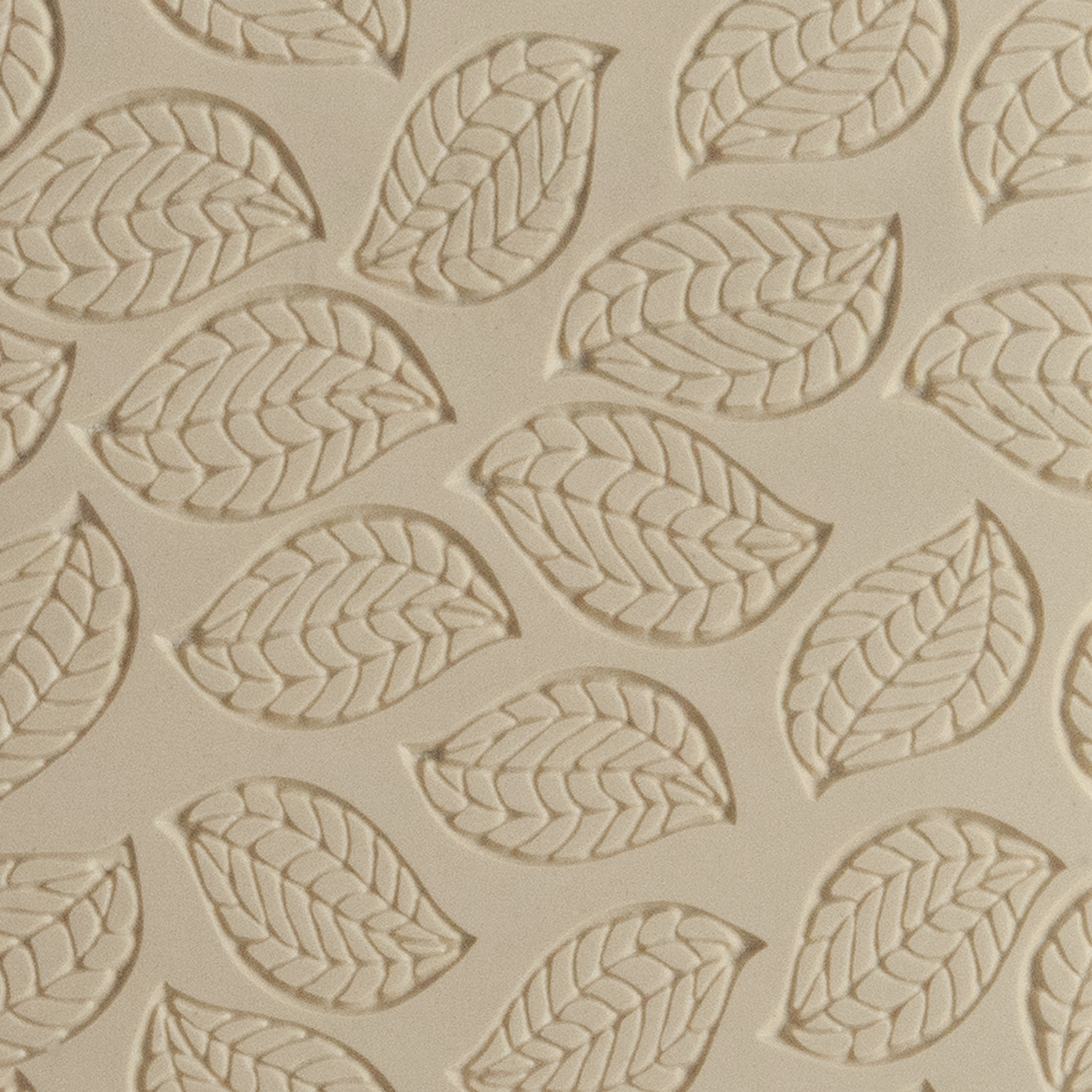 Texture Tile - Falling Leaves Embossed. Beige Texture Tiles are flexible, washable and can be used with any soft clay. Spritz with CoolSlip or dust on Dry Powder Release for stick-free impressions when using metal clay and polymer clay.
