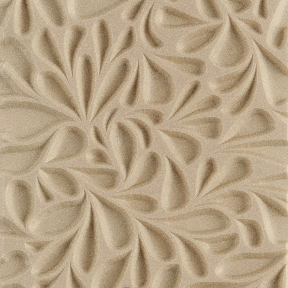 Texture Tile - Fern Gully Embossed. Beige Texture Tiles are flexible, washable and can be used with any soft clay. Spritz with CoolSlip or dust on Dry Powder Release for stick-free impressions when using metal clay and polymer clay.