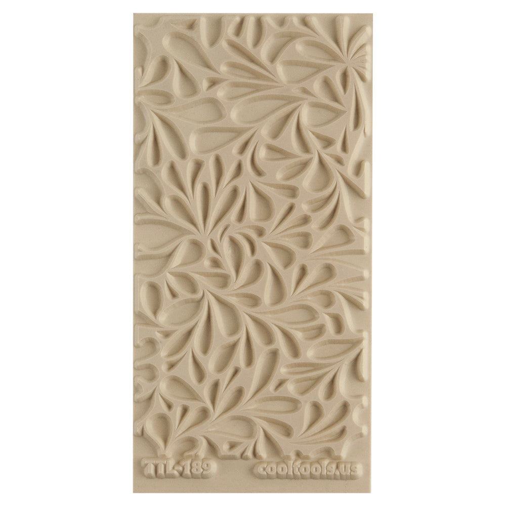 Texture Tile - Fern Gully Embossed. Beige Texture Tiles are flexible, washable and can be used with any soft clay. Spritz with CoolSlip or dust on Dry Powder Release for stick-free impressions when using metal clay and polymer clay.