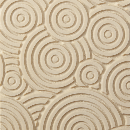 Texture Tile - Deco Circles. Beige Texture Tiles are flexible, washable and can be used with any soft clay. Spritz with CoolSlip or dust on Dry Powder Release for stick-free impressions when using metal clay and polymer clay.