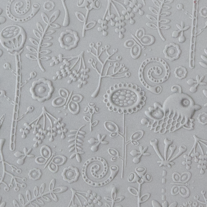 Texture Tile - Folklore Embossed sample rolled into clay