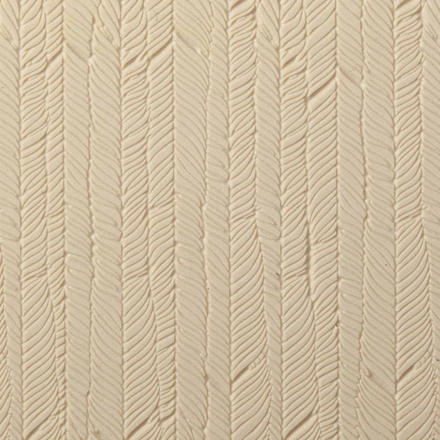 Texture Tile - Feathered Fineline. Beige Texture Tiles are flexible, washable and can be used with any soft clay. Spritz with CoolSlip or dust on Dry Powder Release for stick-free impressions when using metal clay and polymer clay.