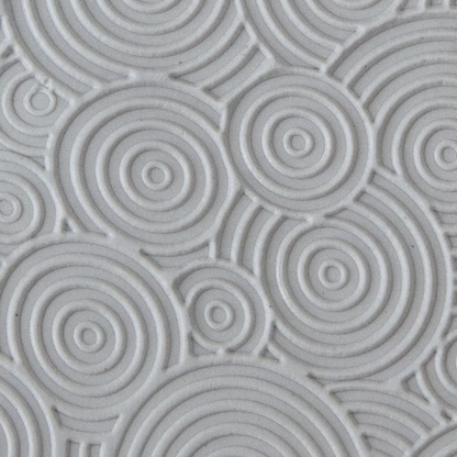 Texture Tile - Deco Circles Mini sample rolled into clay