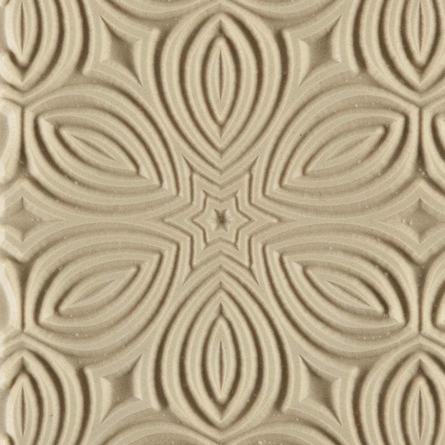 Texture Tile - Kaleidoscope. Beige Texture Tiles are flexible, washable and can be used with any soft clay. Spritz with CoolSlip or dust on Dry Powder Release for stick-free impressions when using metal clay and polymer clay.
