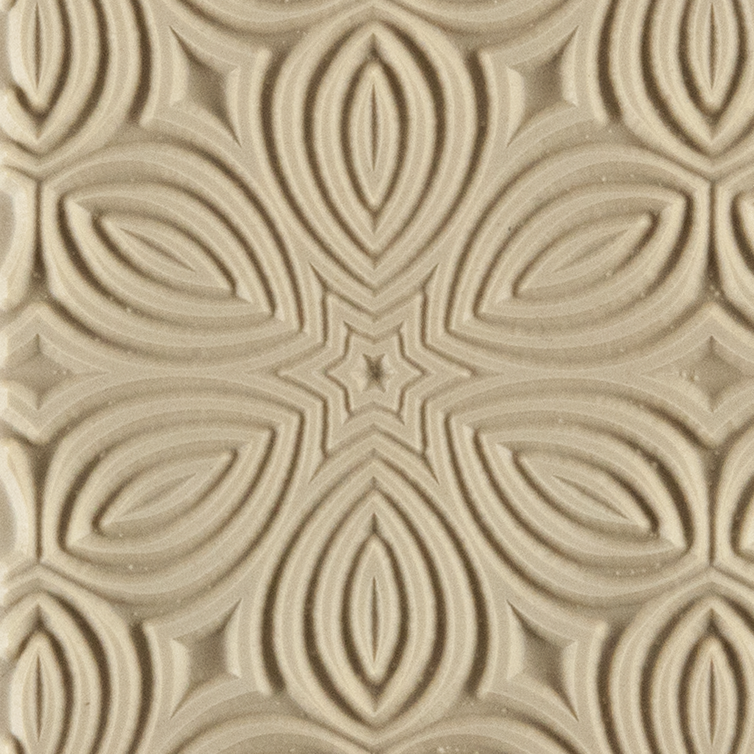 Texture Tile - Kaleidoscope. Beige Texture Tiles are flexible, washable and can be used with any soft clay. Spritz with CoolSlip or dust on Dry Powder Release for stick-free impressions when using metal clay and polymer clay.